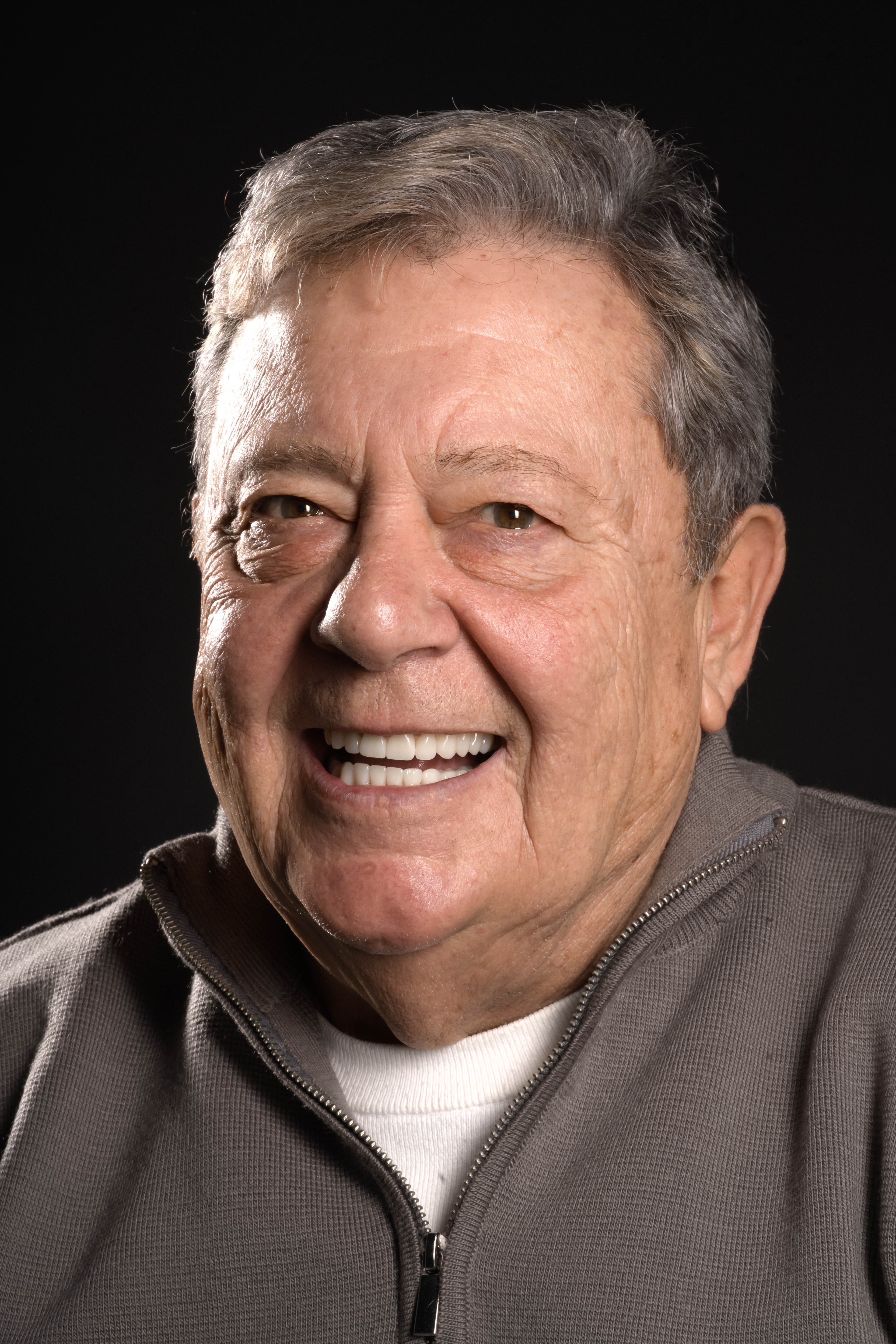 After - Full-Mouth Rehabilitation with Crowns and Implants